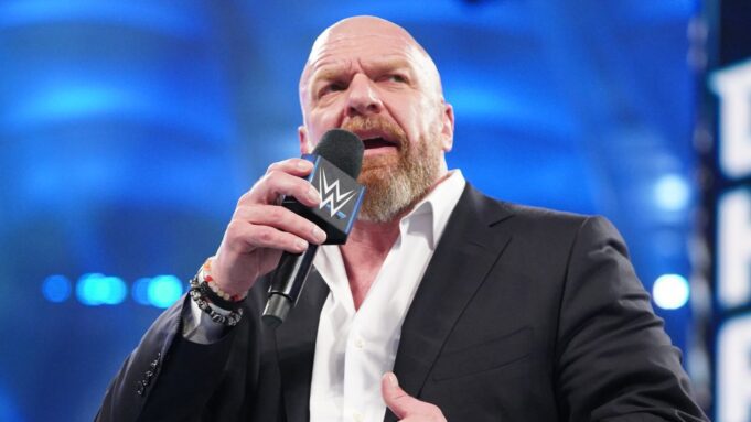 Triple H speaking on a WWE microphone at WWE Elimination Chamber Perth 2024