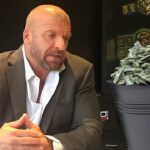 Triple H WWE bucket of cash
