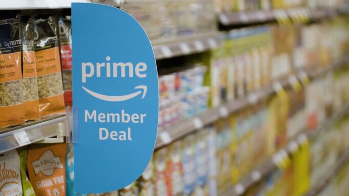 Amazon prime member deal sign on a grocery shelf