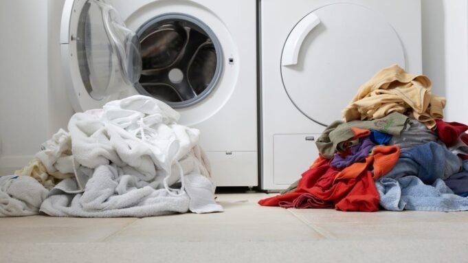 One coloured, one white pile of washing